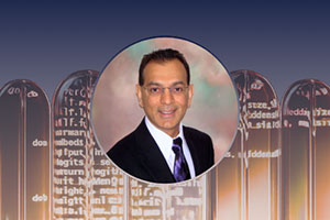 Dr. Suresh Bhavnani headshot on an abstract background
