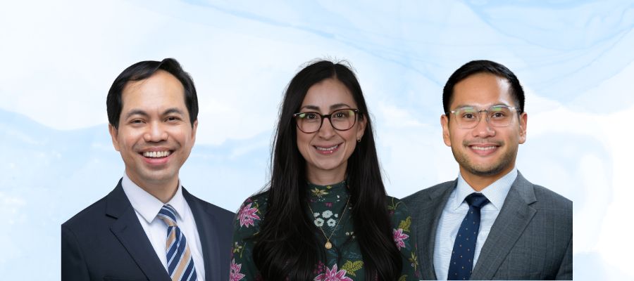 Bobby Belarmino, Asian man 30s short straight hair, big smile, white collar shirt blue suit & tie; Gisela Camacho Hernandez, Hispanic female 30s long dark hair with floral collared shirt; Gregory Brusola, Hispanic male 30s, white collar, grey suit