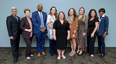 The 2025 AMT inductees are pictured with AMT Director Dr. Holly West