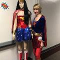 Senior Vice President and General Counsel Carrie King rounding up donors with Trixie in Legal and Compliance