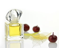 perfume bottle and fruit
