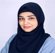 Picture of a woman wearing a hijab smiling
