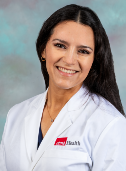 Image of a lady in a UTMB white lab coat smiling