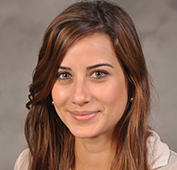 Picture of a woman with brown hair smiling