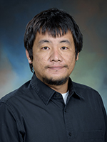 Picture of a man wearing a black shirt