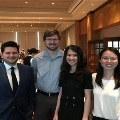 UTMB pathology residents gathered in a conference setting, engaging in academic discussion and presentation activities during a professional medical meeting or educational event.