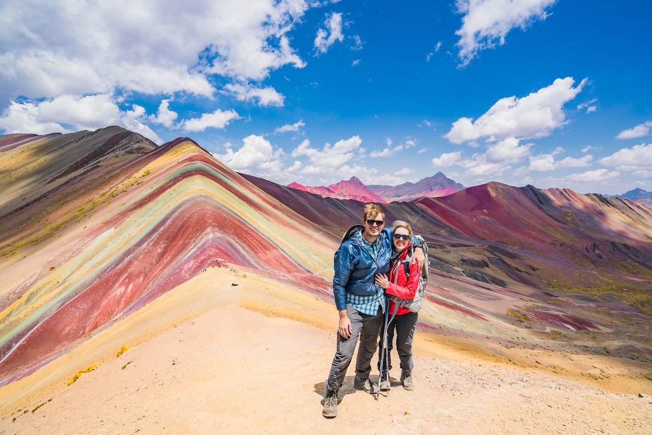Adam and Christine Kley hike Montaña de Colores, or Rainbow Mountain, in Peru.