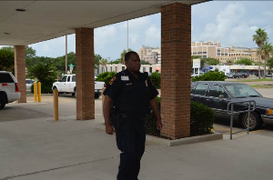 Officer Dorsey entering University Eye Clinic