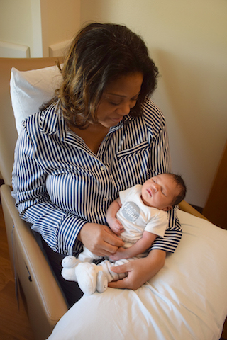 Dr. Brandy Wright holds her son, Westbrook, who was one of the first babies to be born at the LCC Hospital. As of July 11, the LCC LDRP team had delivered 51 babies.
