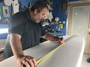 Stephen Pearson Shaping a surfboard