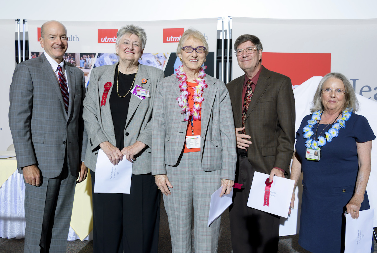 Dr. Callender (left) with 45-year employees Dr. Joan Richardson, Dr. Barbara Thompson, Johnny Peterson, PhD, and Shirley McGraw.