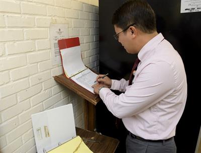 Ong records his “in” and “out” times at the Ramsey Unit 