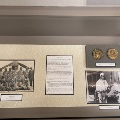 Photographs and medallions related to Herman Barnett