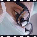 Surgeon with magnifying eyeglasses