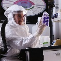 Virology researcher in personal protective equipment