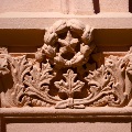 Bas-relief sculpture of leaves on column