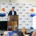 Alpha Omega Alpha Student President Gabriel Rivera speaking on stage