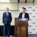 Alpha Omega Alpha Student President Gabriel Rivera introducing Dr. Bianco to the stage