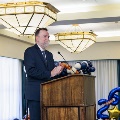 Dr. Bianco speaking on stage