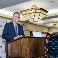 Dr. Bianco speaking on stage