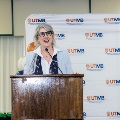 Dr. Rastellini delivering a speech on stage