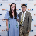 Alpha Omega Alpha Faculty Councilor, Bernard M. Karnath, MD, posing with newly inducted member