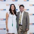 Alpha Omega Alpha Faculty Councilor, Bernard M. Karnath, MD, posing with newly inducted member