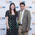 Alpha Omega Alpha Faculty Councilor, Bernard M. Karnath, MD, posing with newly inducted member