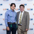 Alpha Omega Alpha Faculty Councilor, Bernard M. Karnath, MD, posing with newly inducted member