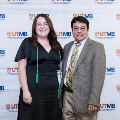 Alpha Omega Alpha Faculty Councilor, Bernard M. Karnath, MD, posing with newly inducted member