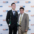 Alpha Omega Alpha Faculty Councilor, Bernard M. Karnath, MD, posing with newly inducted member