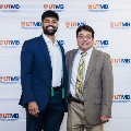 Alpha Omega Alpha Faculty Councilor, Bernard M. Karnath, MD, posing with newly inducted member