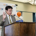 Alpha Omega Alpha Faculty Councilor, Bernard M. Karnath, MD, reciting the Declaration of Geneva