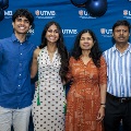 Alpha Omega Alpha Inductee posing with family