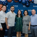 Alpha Omega Alpha Inductee posing with family