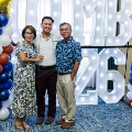 Alpha Omega Alpha Inductee posing with family
