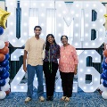 Alpha Omega Alpha Inductee posing with family