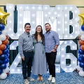 Alpha Omega Alpha Inductee posing with family