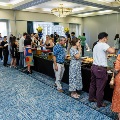 Alpha Omega Alpha attendees in line for food