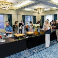 Alpha Omega Alpha attendees in line for food