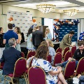 Alpha Omega Alpha attendees mingling together