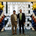 Alpha Omega Alpha Inductee posing next to Dr. Karnath