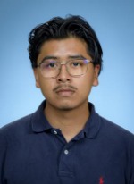 Professional headshot of Abraham Barrientos with short black hair, wearing a navy polo