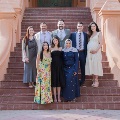 group photo of ob residents in front of old red