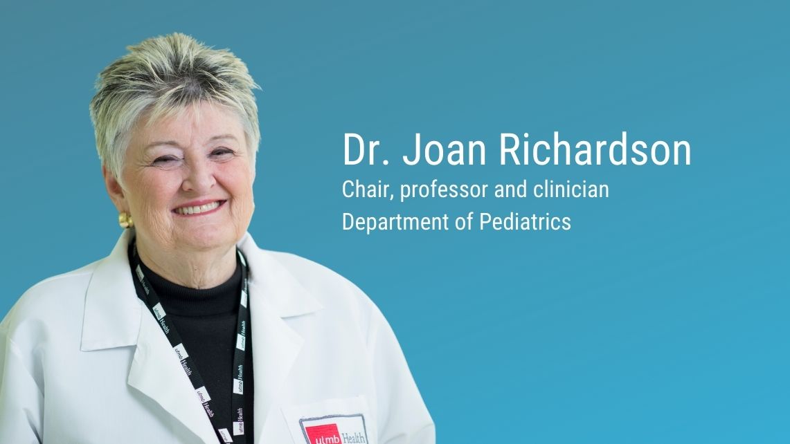 A person wearing a white UTMB Health lab coat stands against a blue background beside text that reads ‘Dr. Joan Richardson, chair, professor and clinician, Department of Pediatrics.