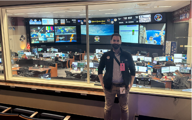Man standing in front of room at NASA
