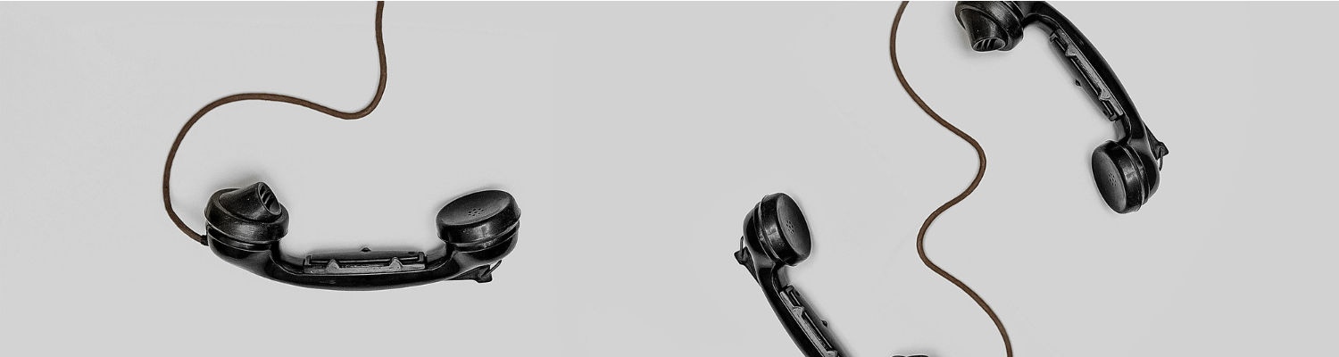 Black, vintage landline telephones