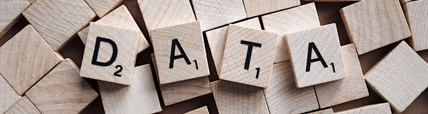 Scrabble pieces spelling the word DATA