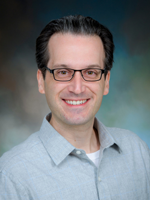 Portrait of Corey Jannett