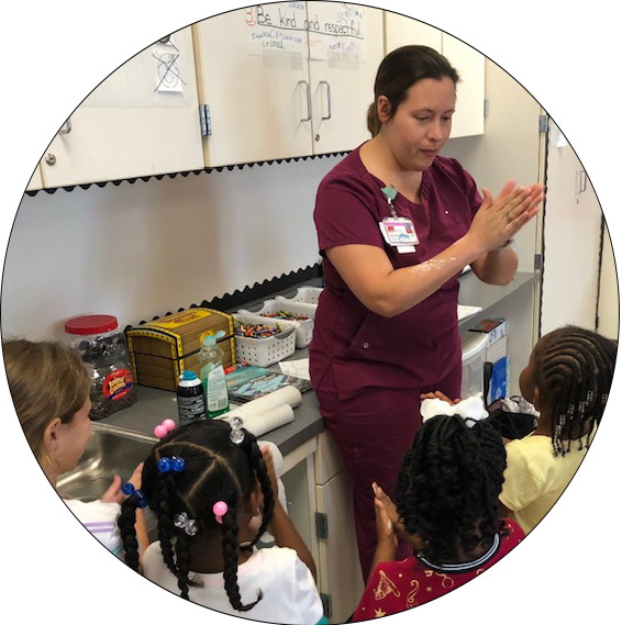 Nurses with children